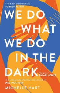 Cover image for What We Do in the Dark by Michelle Hart